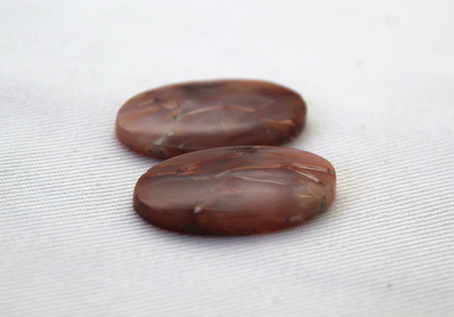 NICE Pair of Petrified Wood Cabochons pink Oval