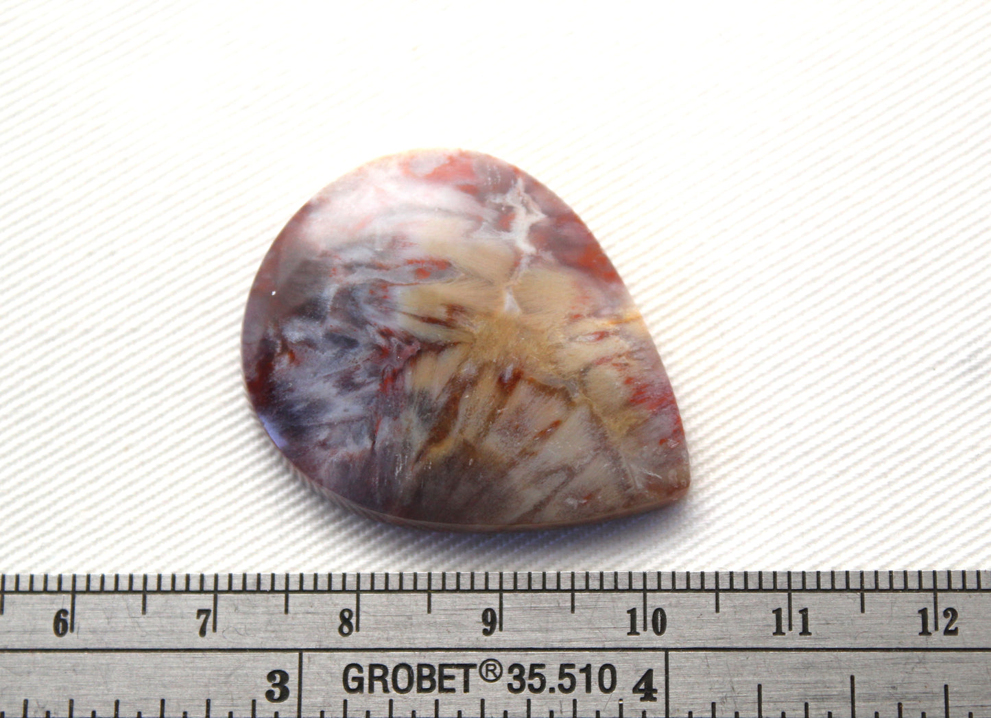 One Sagenite Spray Agate Cabochon gemstone