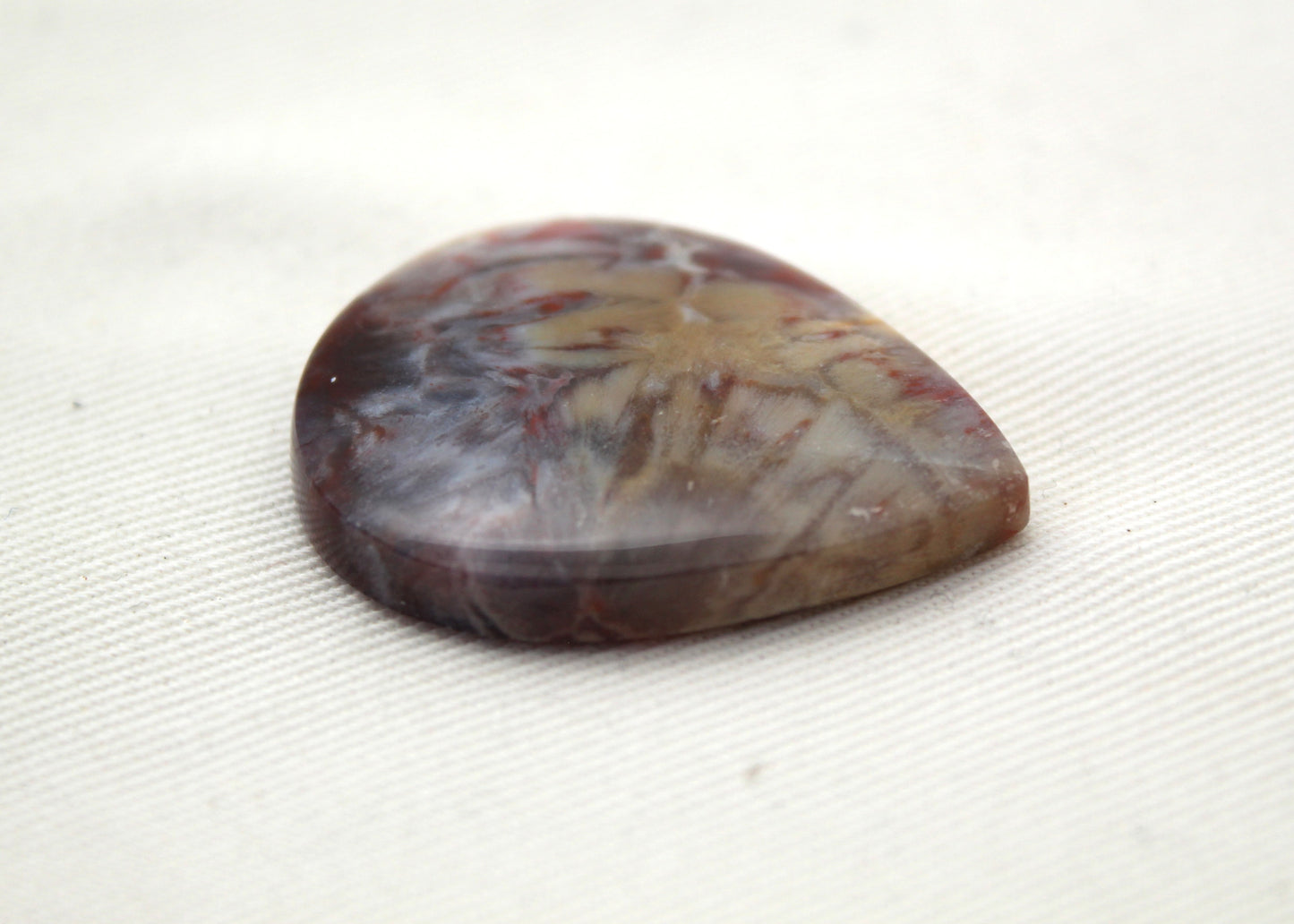 One Sagenite Spray Agate Cabochon gemstone