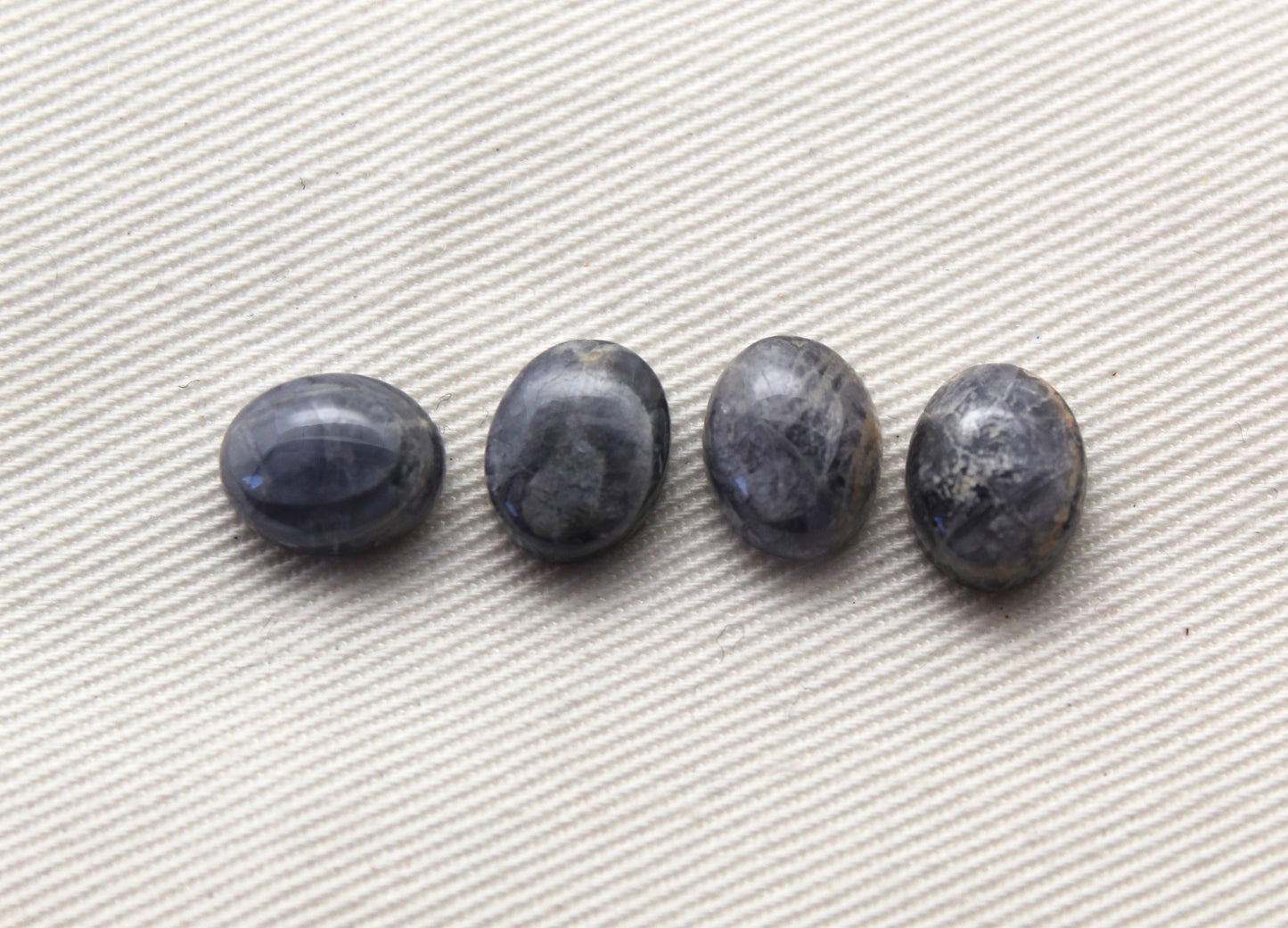 FOUR Iolite cabochons gemstones 8X10MM oval