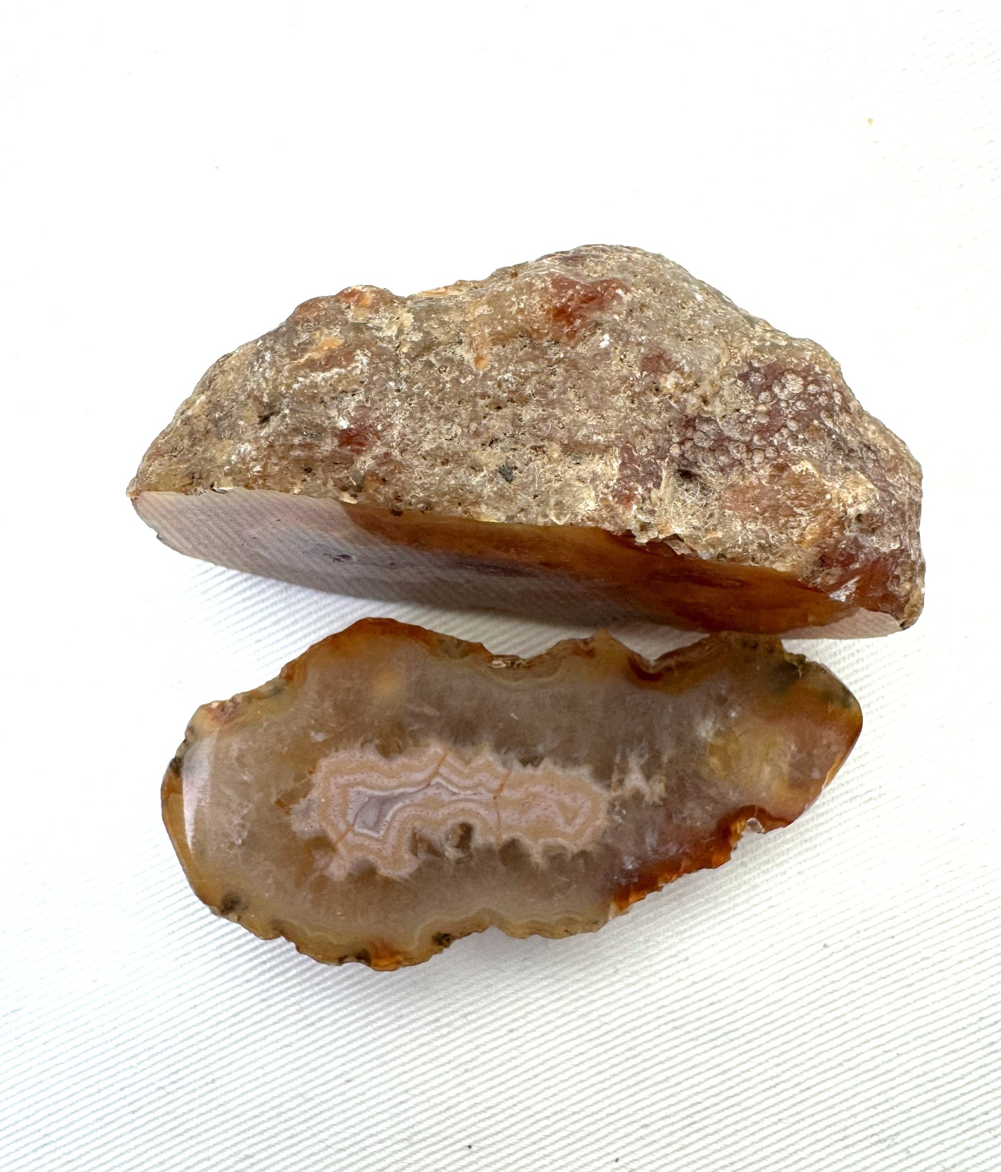 Indonesian banded Agate nodule polished yellow pink