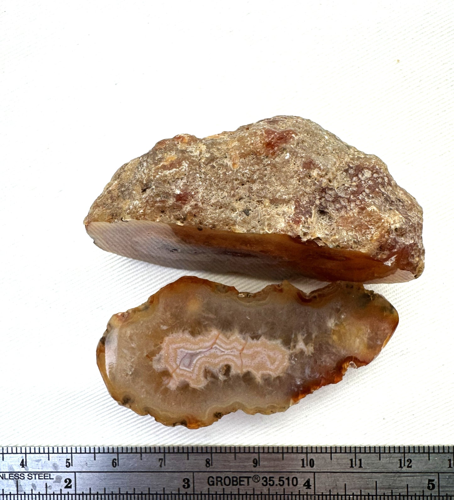 Indonesian banded Agate nodule polished yellow pink