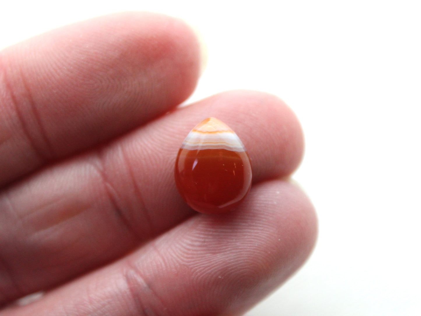 <tc>Quatre Cabochons de Sardonyx coupe poire 10x12 MM</tc>