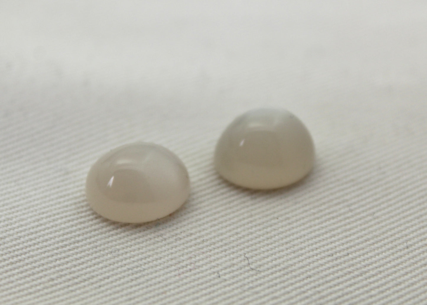 TWO white Moonstone cabochons Gemstones Oval