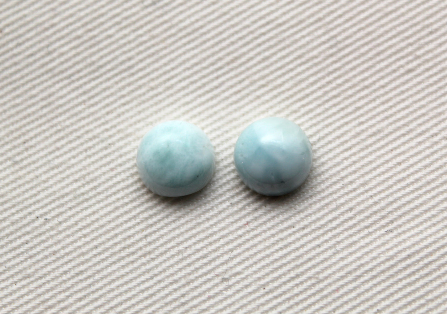 TWO round larimar of 8 mm cabochons