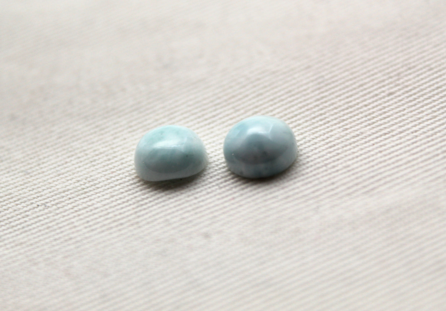 TWO round larimar of 8 mm cabochons
