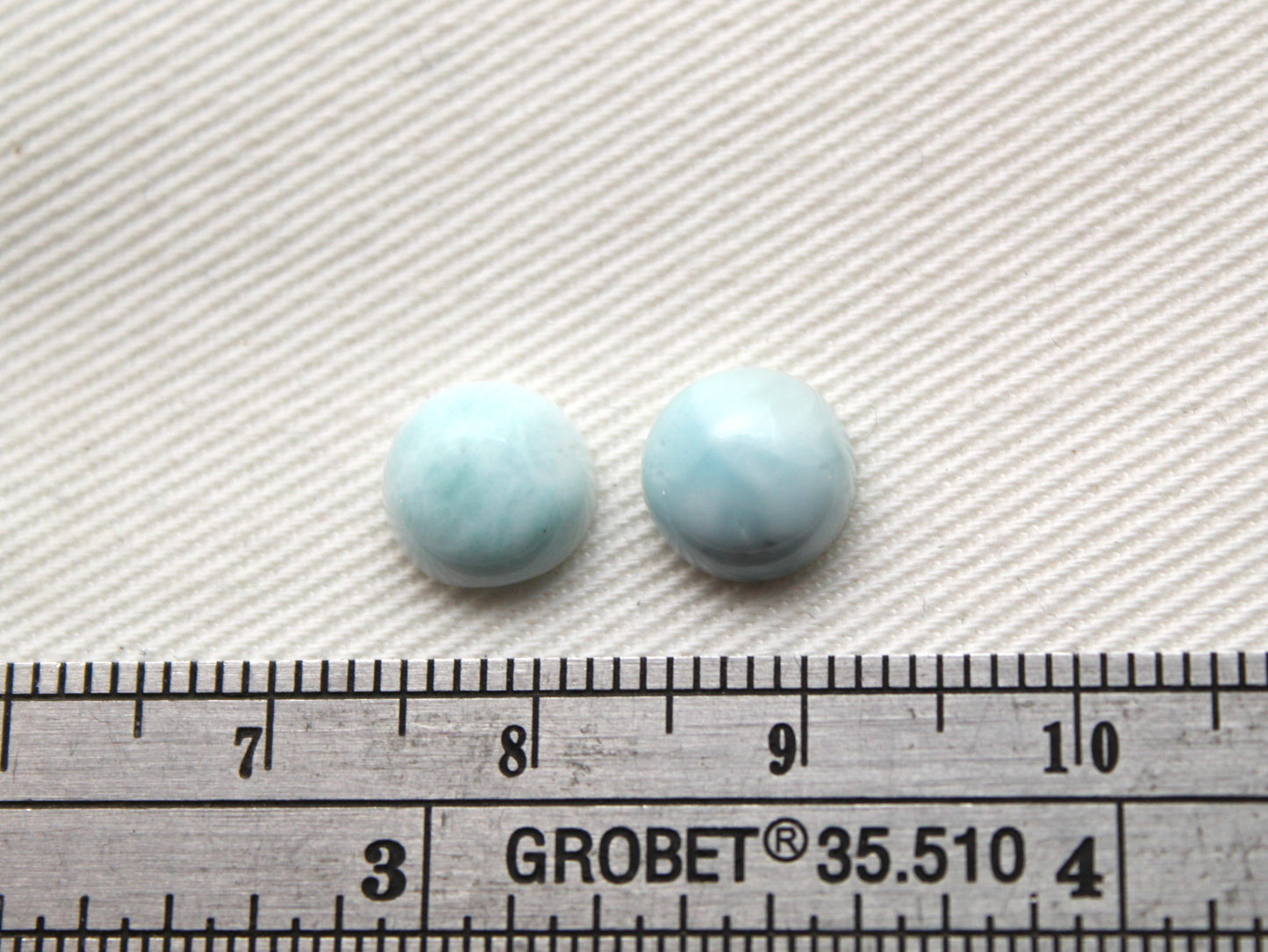 TWO round larimar of 8 mm cabochons
