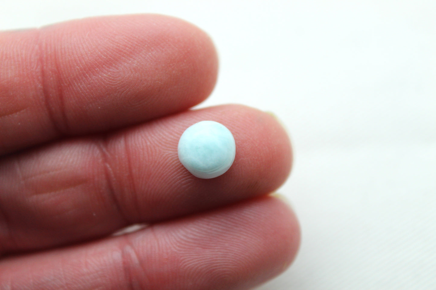 TWO round larimar of 8 mm cabochons