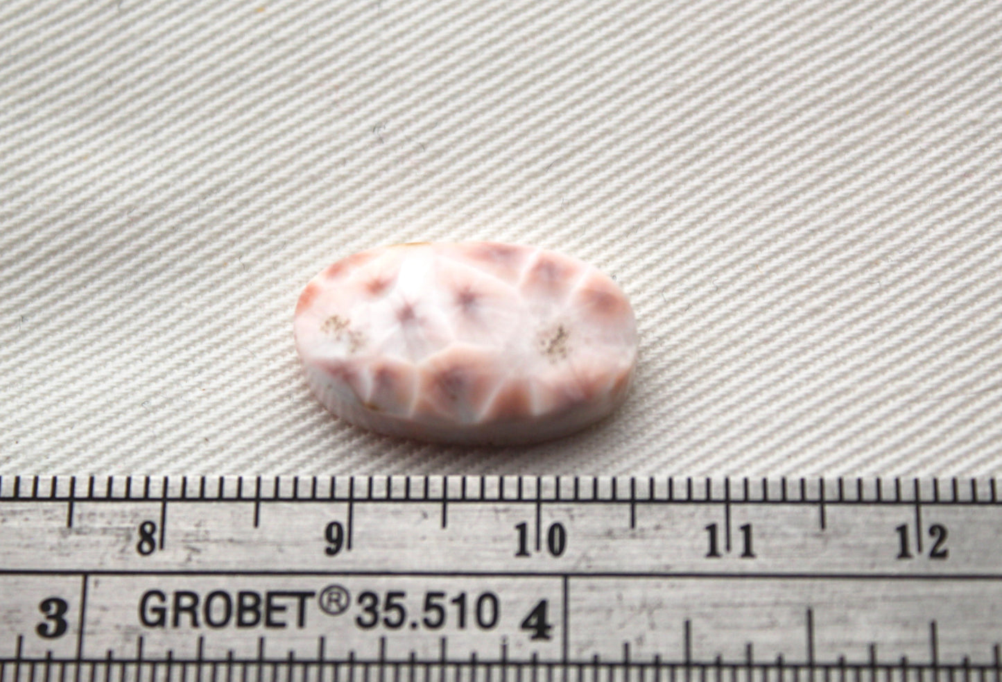 Small Thomsonite Oval Cabochon pink gemstone