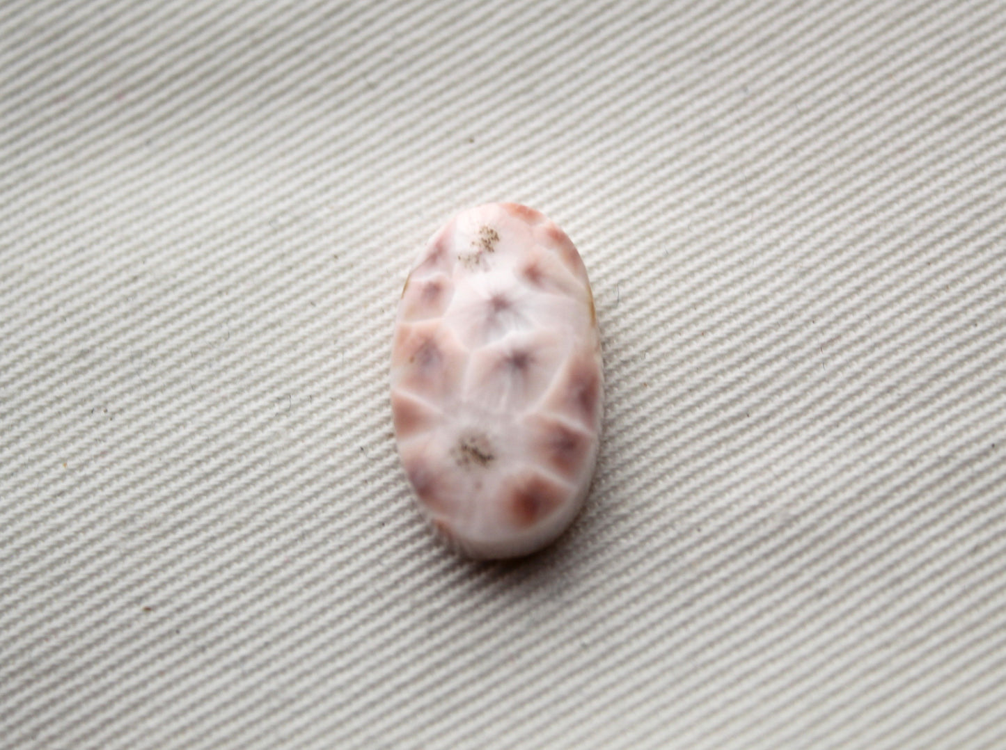 Small Thomsonite Oval Cabochon pink gemstone