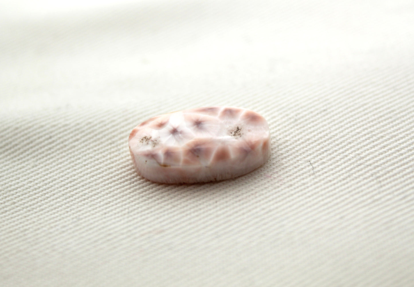 Small Thomsonite Oval Cabochon pink gemstone