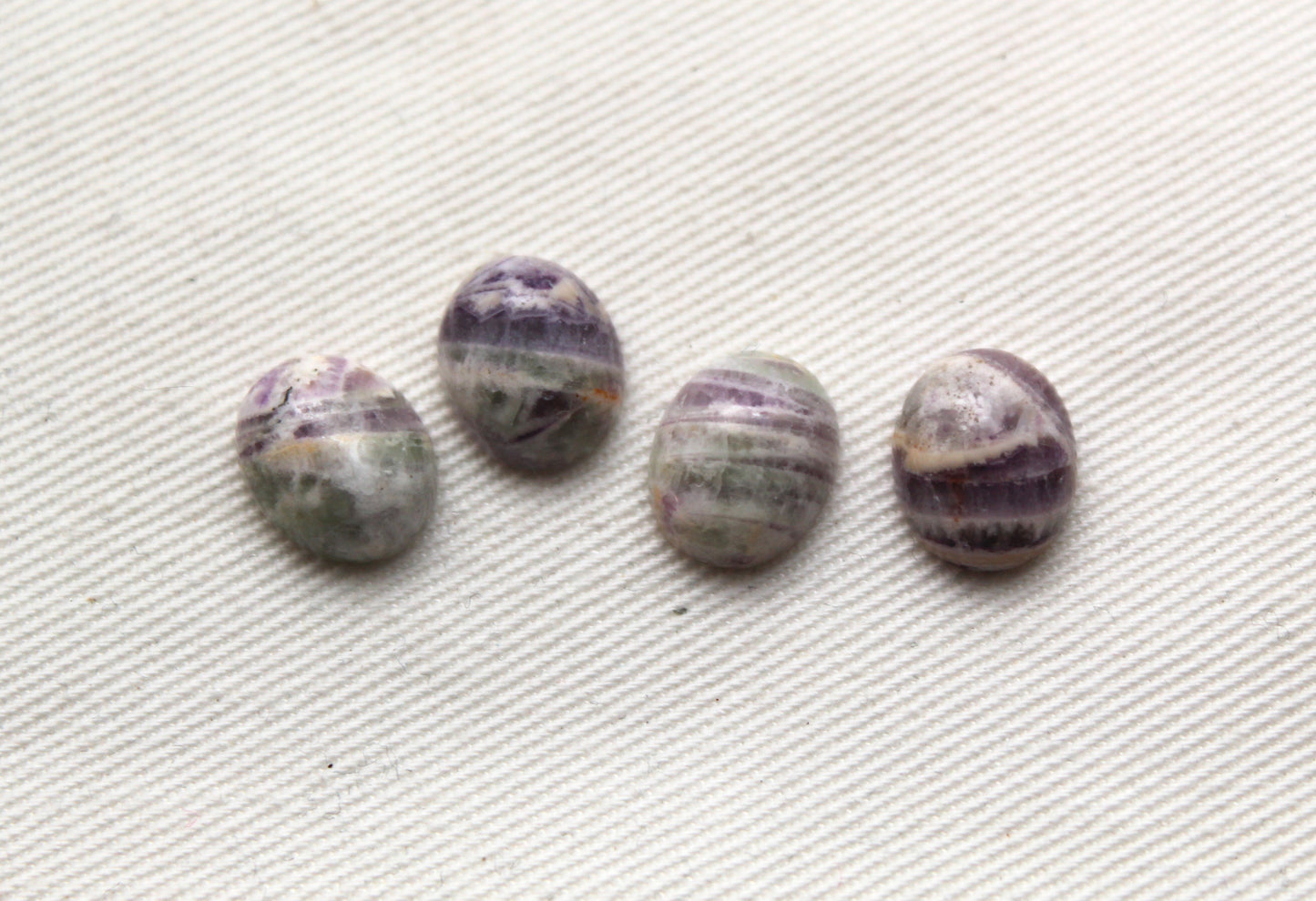 FOUR amethyst Chevron oval cabochons 9X11MM