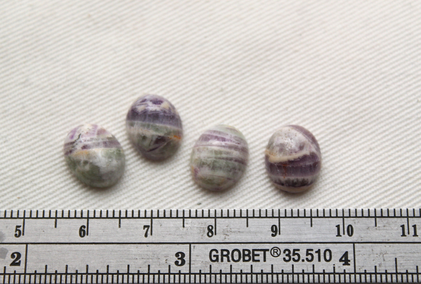 FOUR amethyst Chevron oval cabochons 9X11MM
