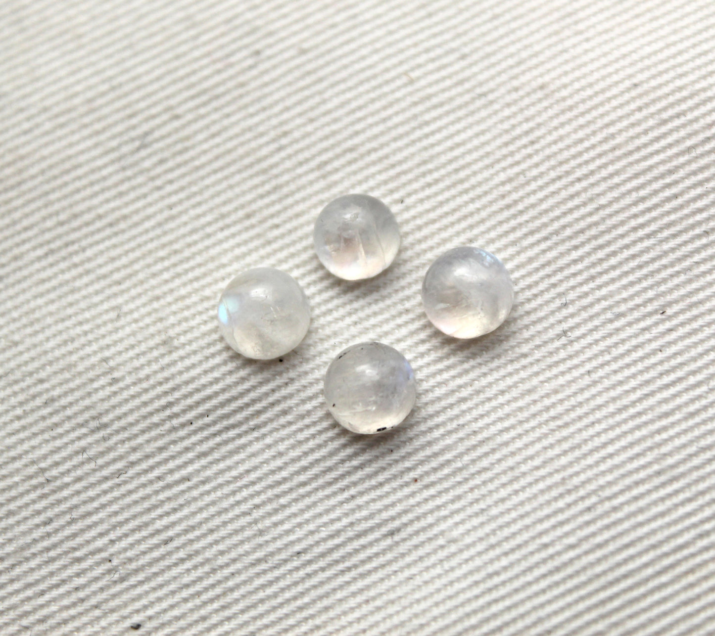 <tc>Deux cabochons de Pierre de Lune ovale 12X10MM</tc>