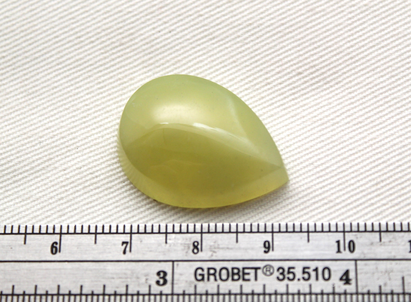 One Vesuvianite Cabochon Gemstone light green