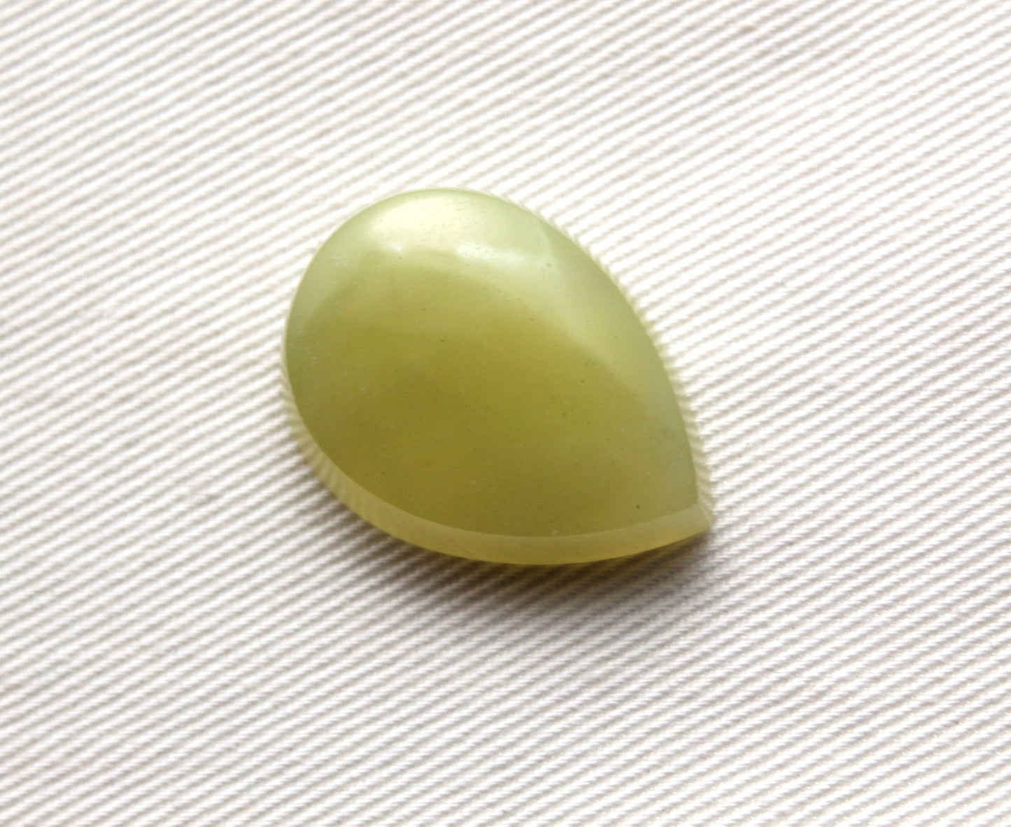 One Vesuvianite Cabochon Gemstone light green