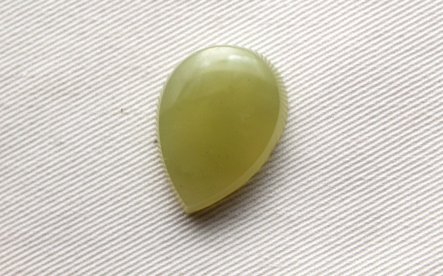 One Vesuvianite Cabochon Gemstone light green