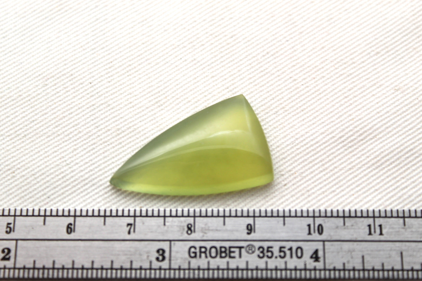 One Vesuvianite Cabochon Gemstone light green