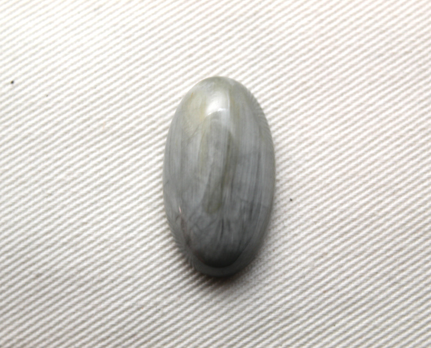 Un cabochon oeil de crapaud Gemstone gris ovale 14X25MM