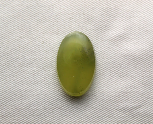 One Vesuvianite Cabochon Gemstone light green Oval