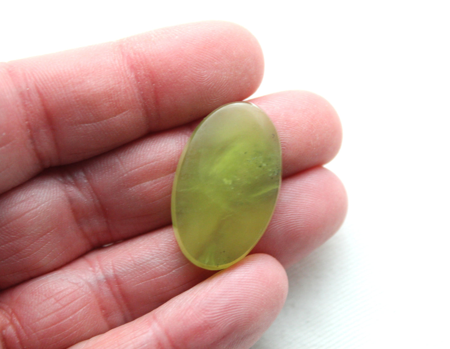 One Vesuvianite Cabochon Gemstone light green Oval