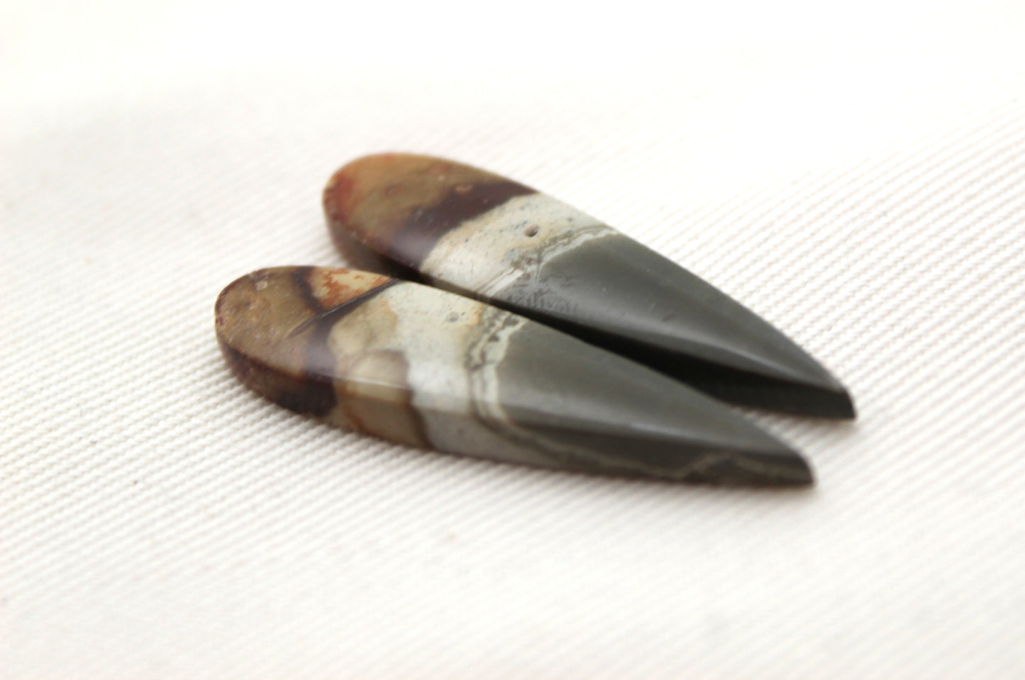 Matching pair of polychrome Jasper Cabochons teardrop
