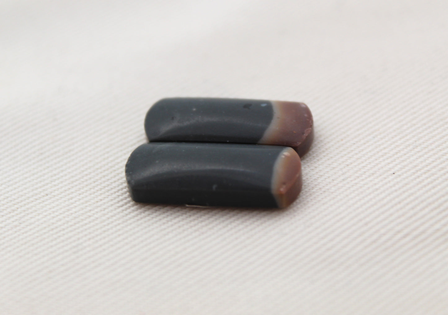 Small pair of Indonesian Polychrome Jasper Cabochons