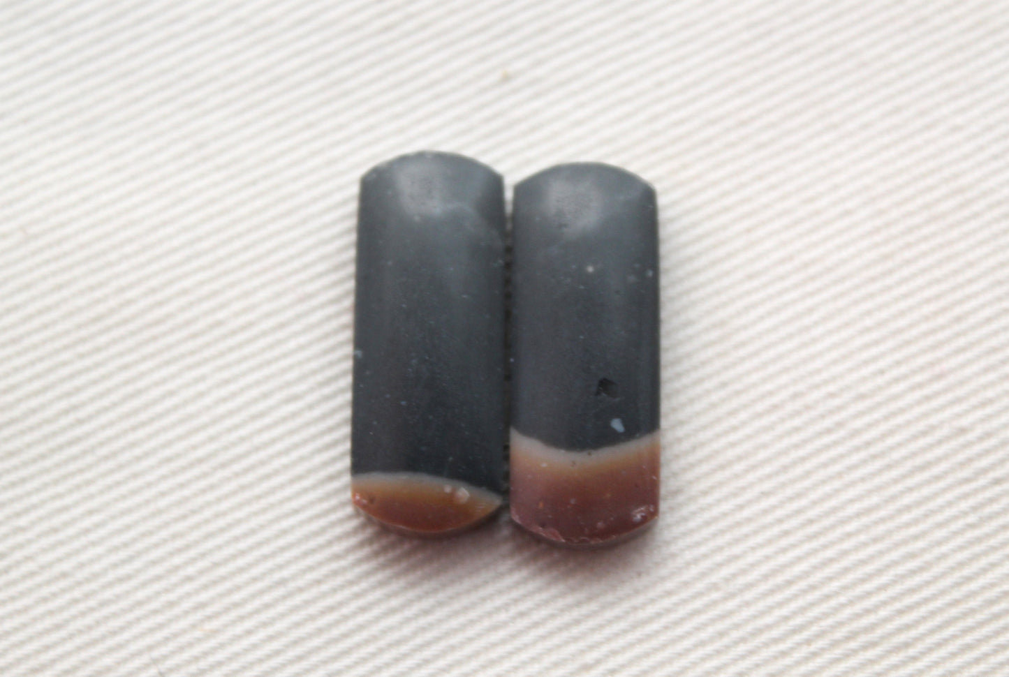 Small pair of Indonesian Polychrome Jasper Cabochons
