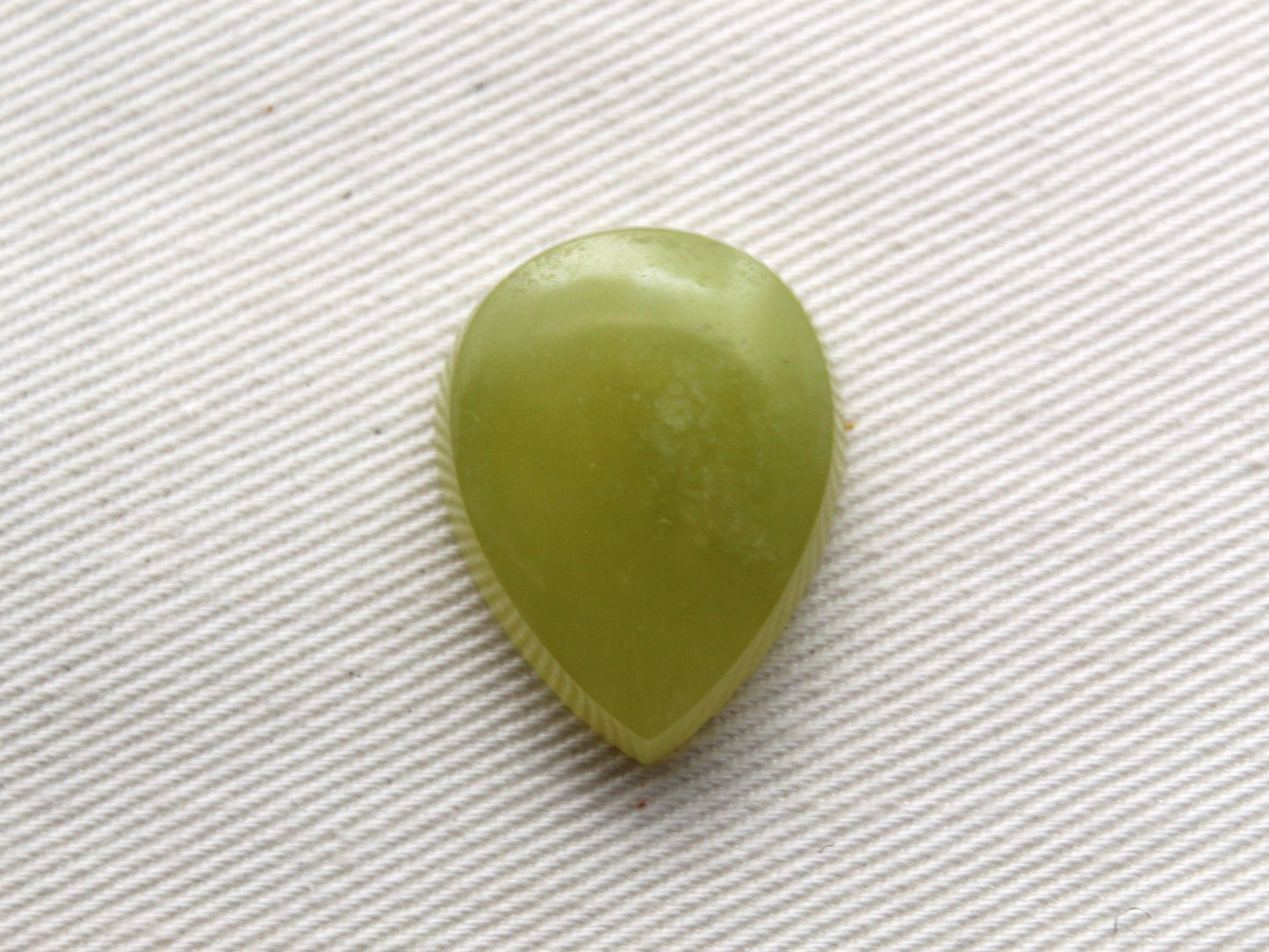 One Vesuvianite Cabochon Gemstone light green