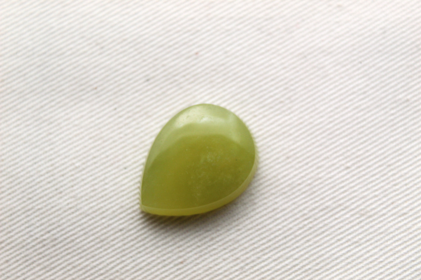 One Vesuvianite Cabochon Gemstone light green