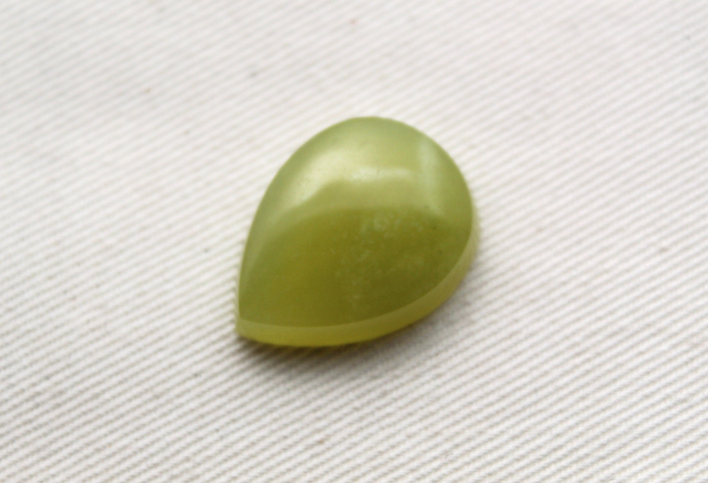One Vesuvianite Cabochon Gemstone light green