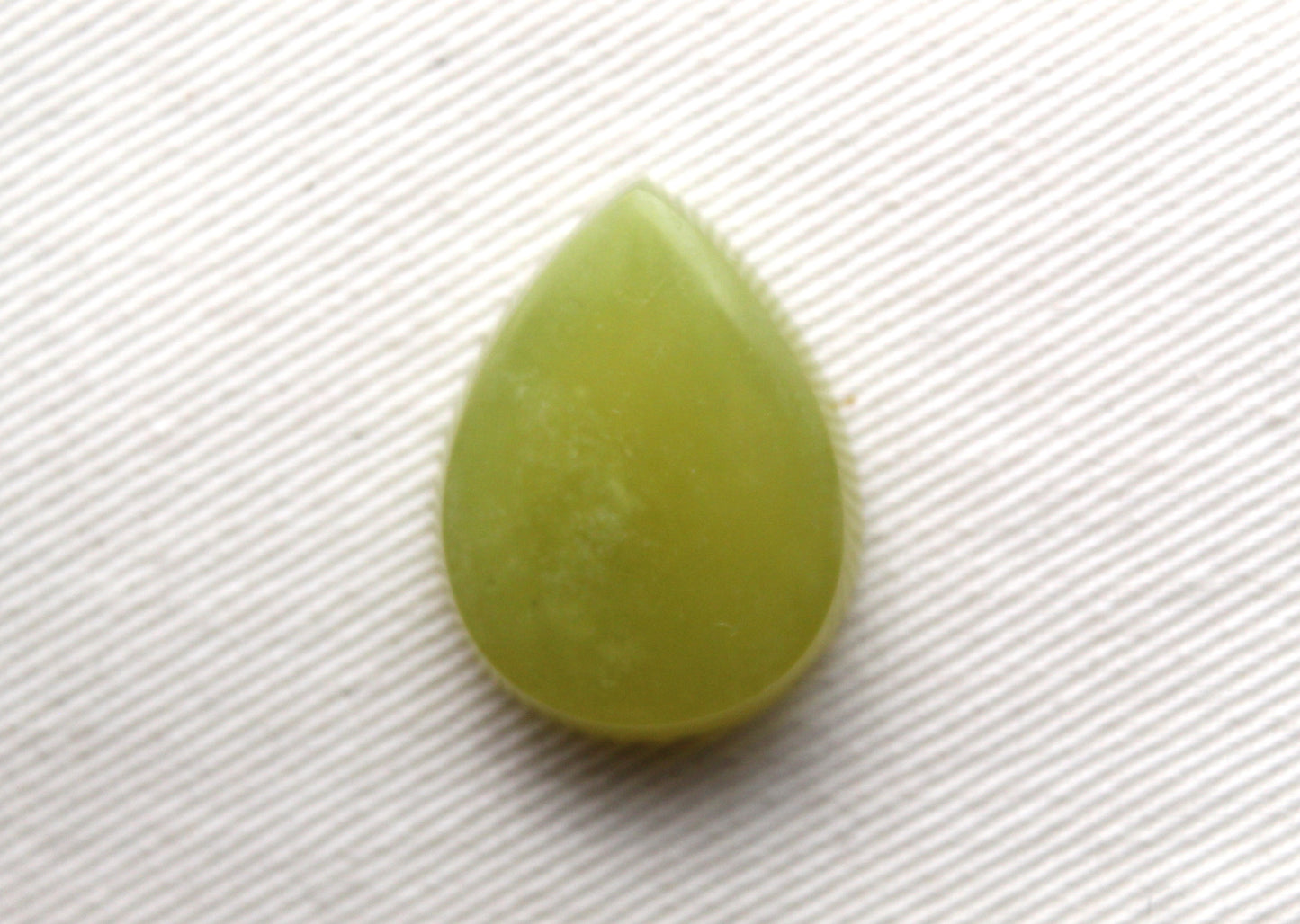 One Vesuvianite Cabochon Gemstone light green