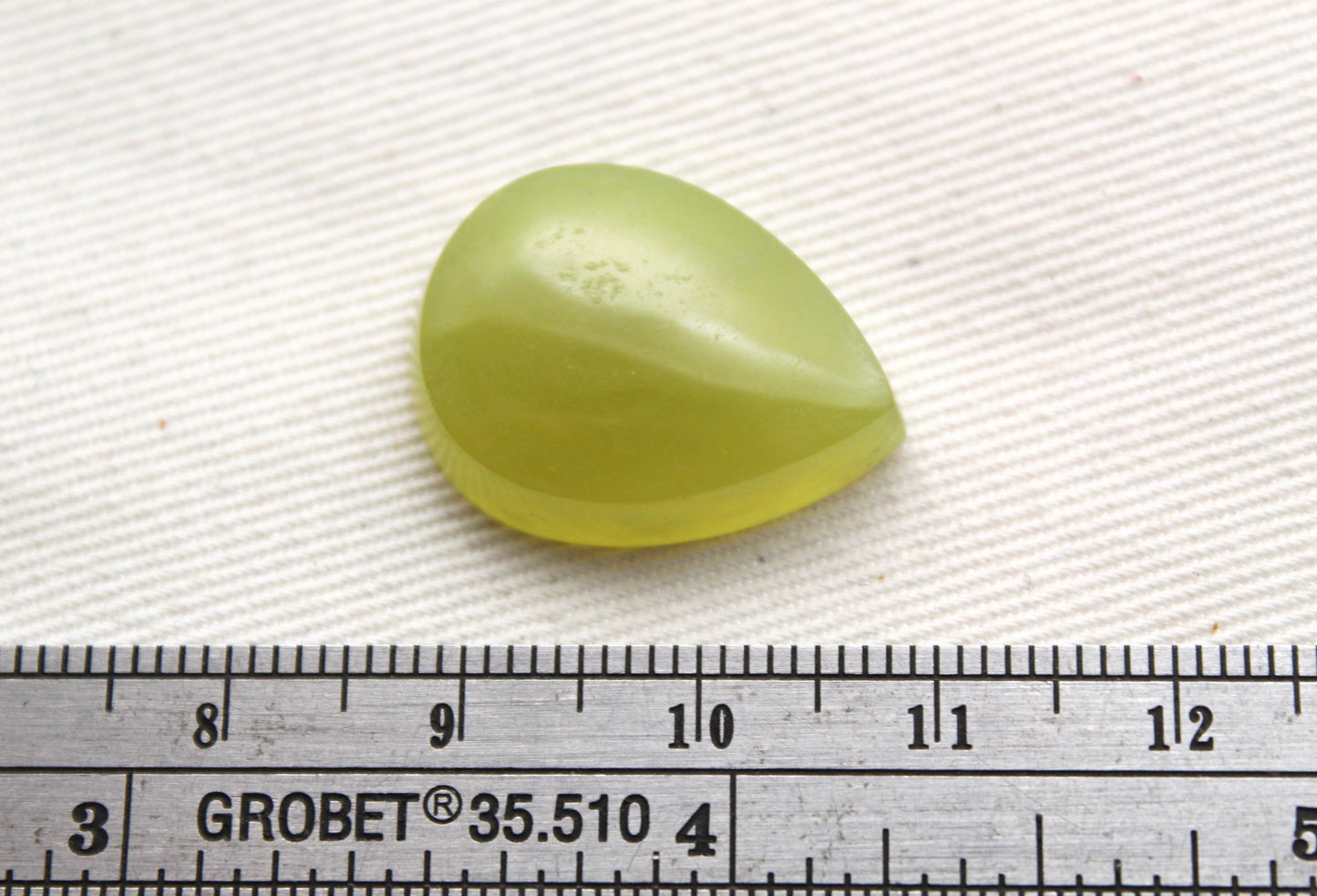 One Vesuvianite Cabochon Gemstone light green
