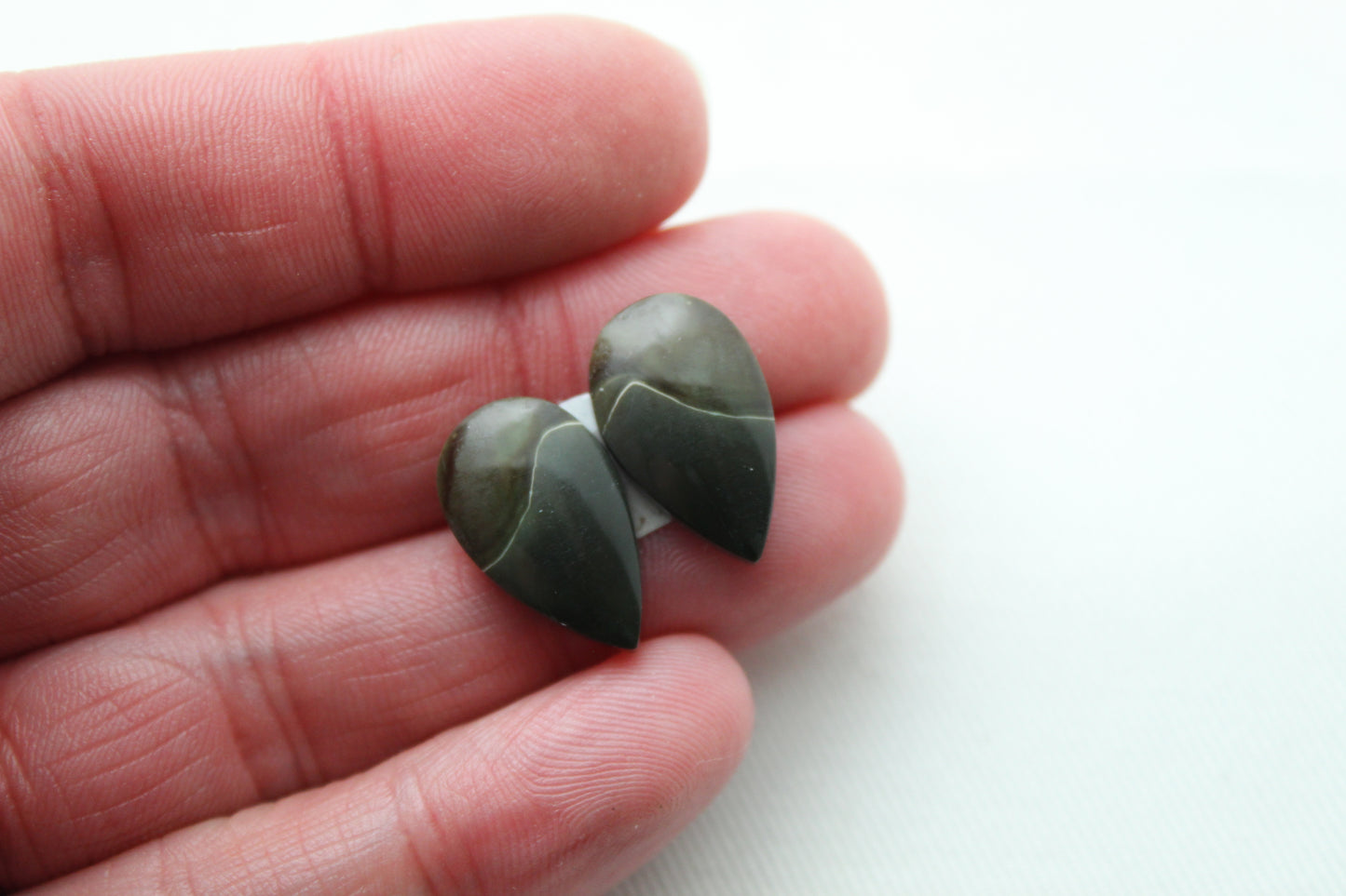 Small dark Matching pair of polychrome Jasper Cabochons green