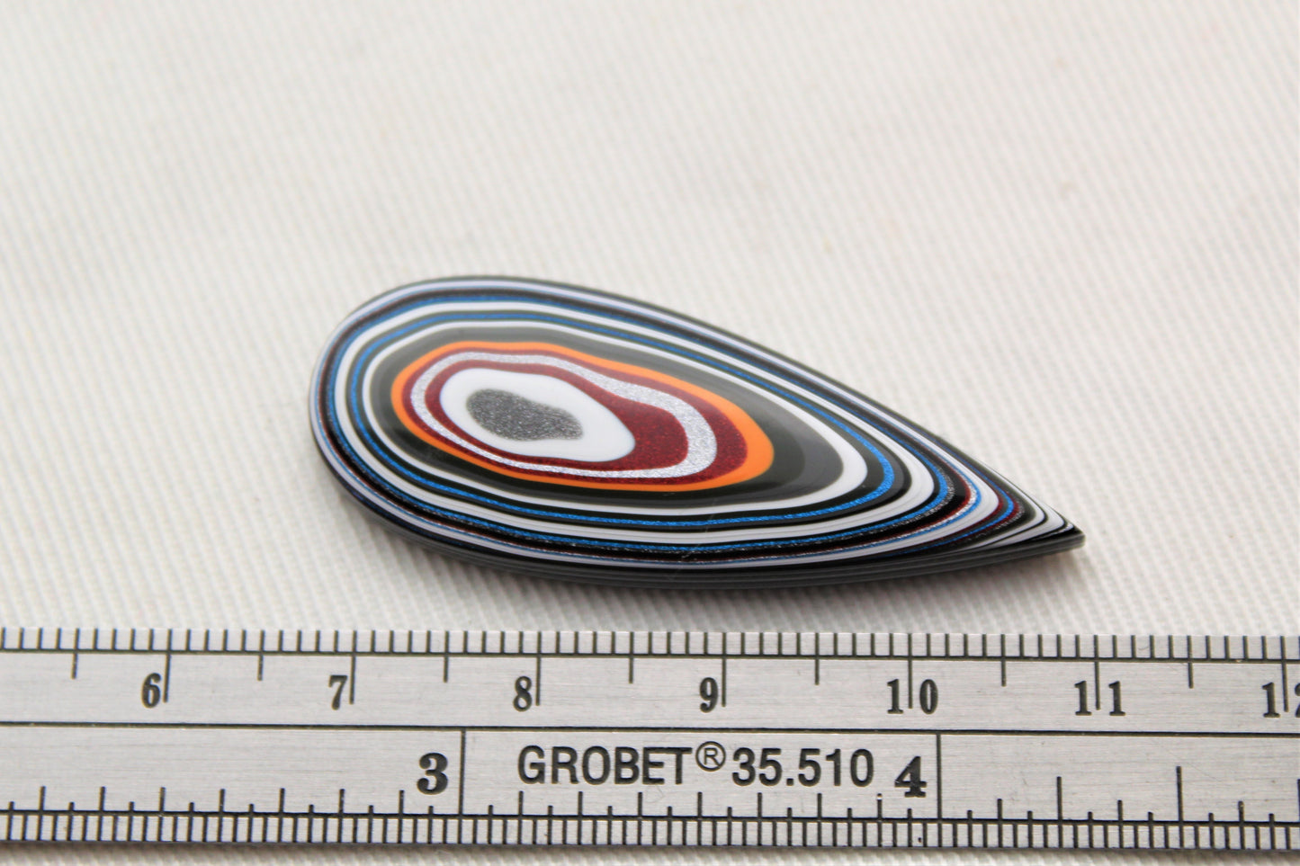 Fordite Cabochon teardrop yellow white red