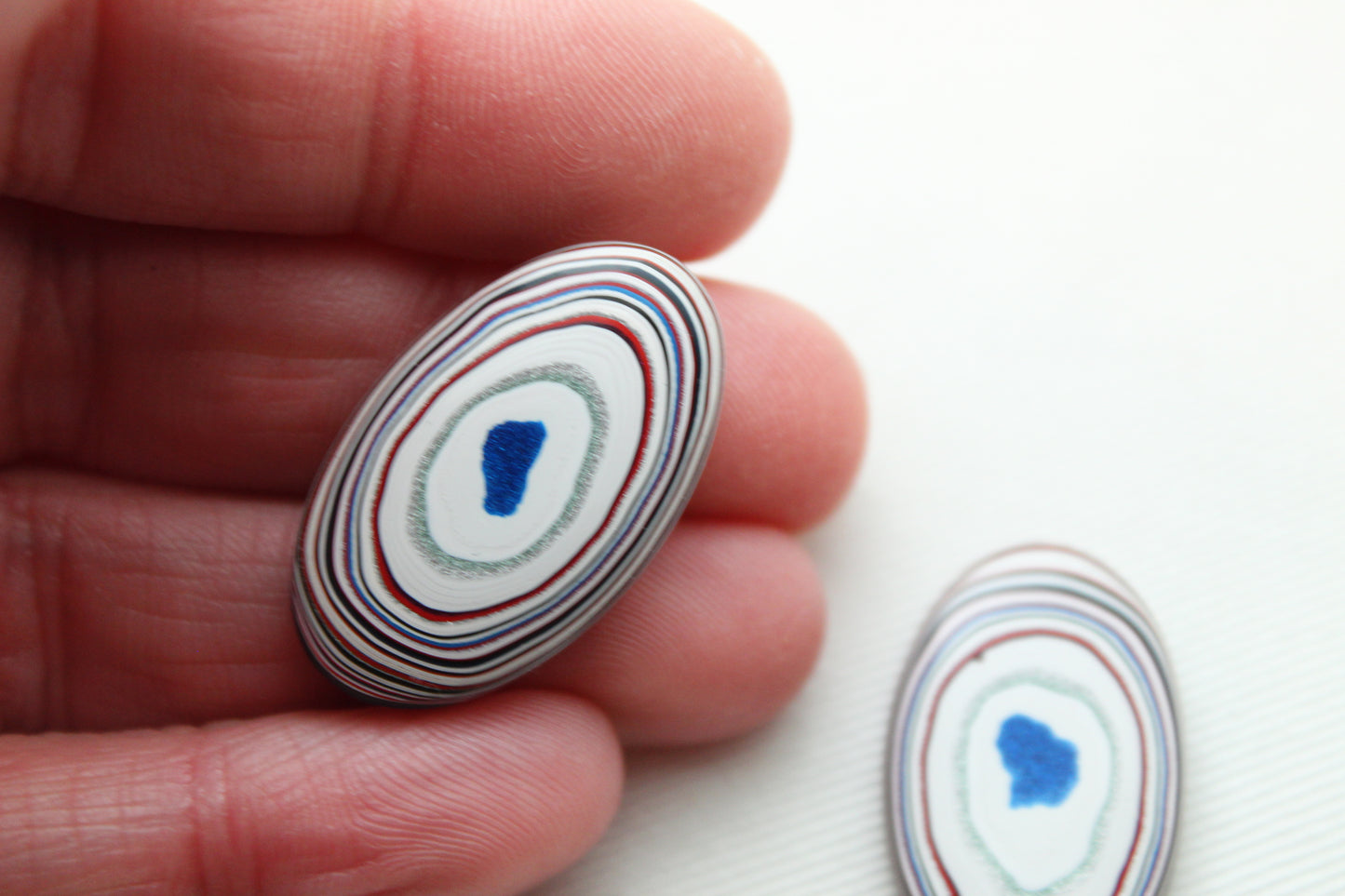 TWO Fordite Cabochon white red green teardrop