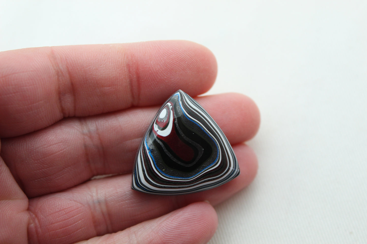 Trillion Fordite Cabochon white red black blue