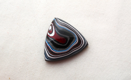 Trillion Fordite Cabochon white red black blue