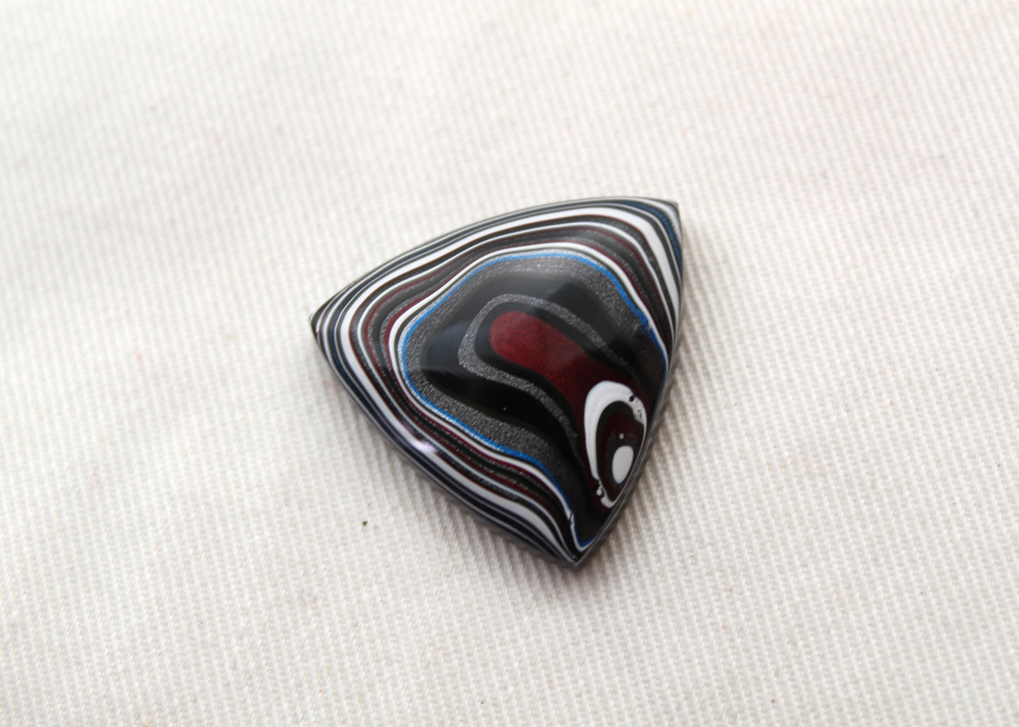 Trillion Fordite Cabochon white red black blue