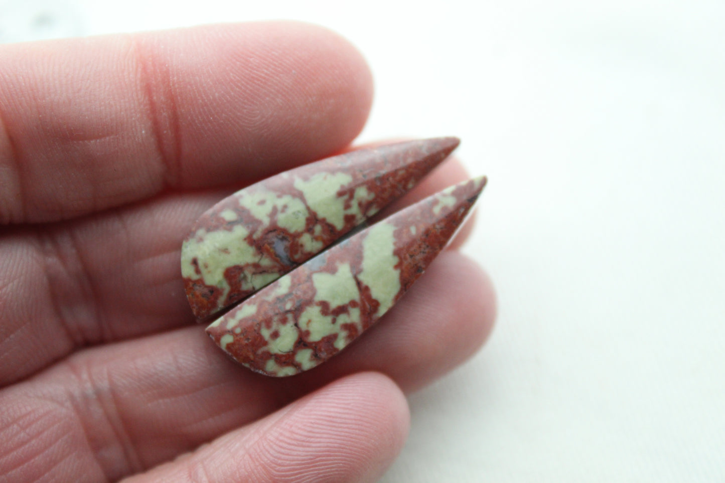 Pair of Red Fiber Jasper Cabochons