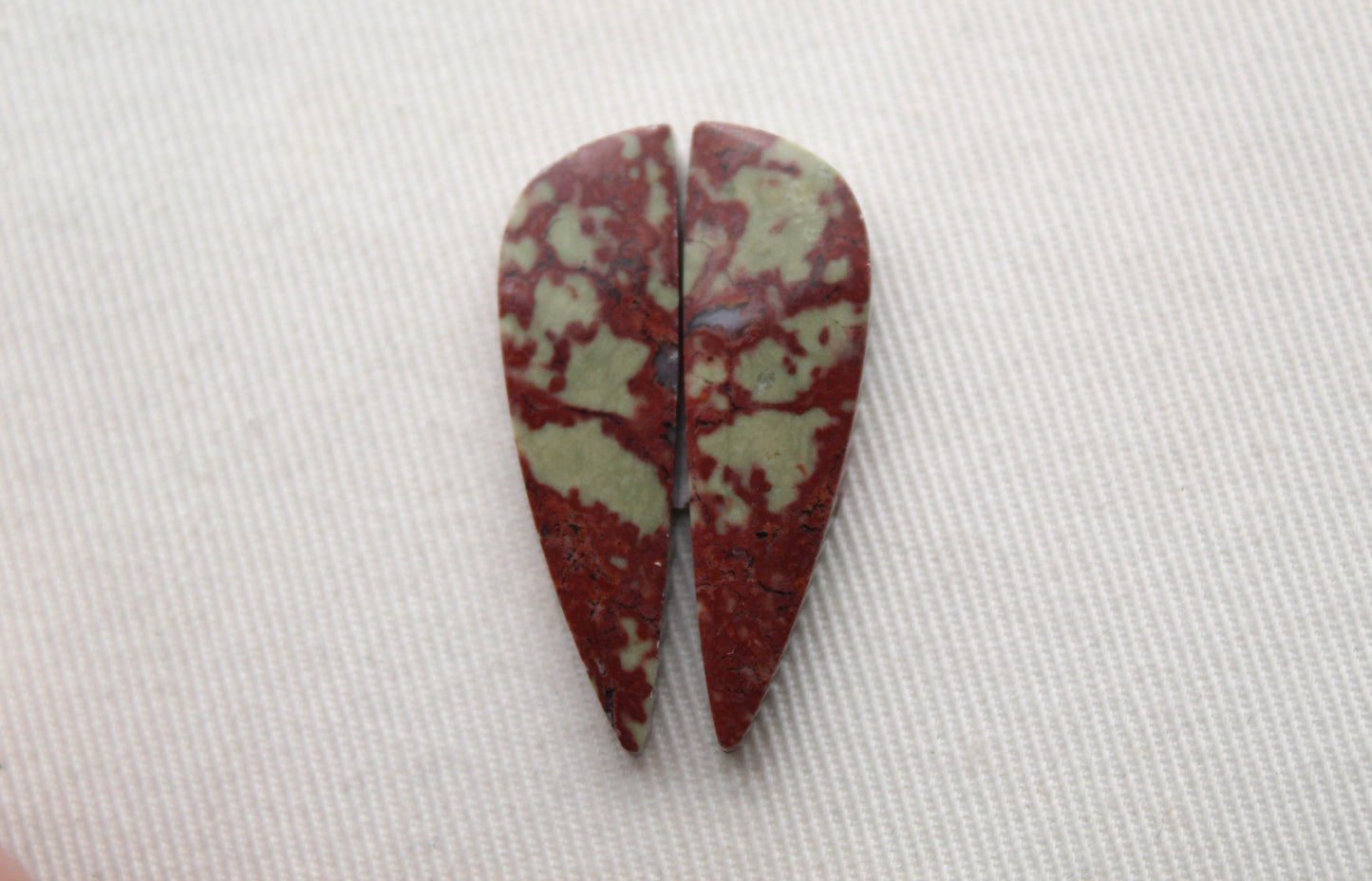 Pair of Red Fiber Jasper Cabochons