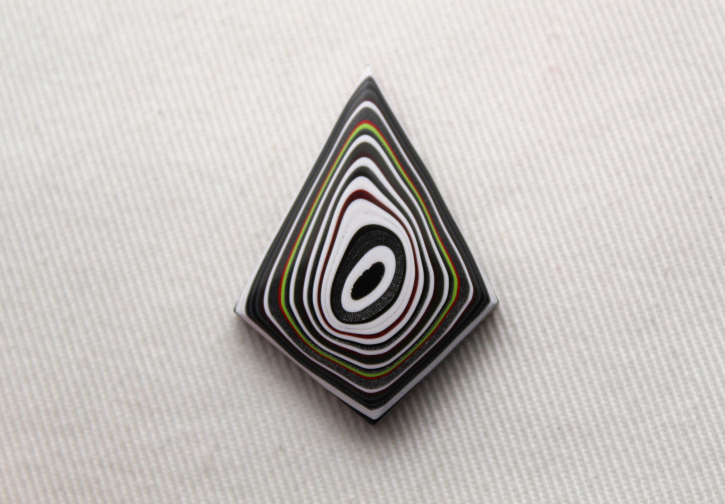 Kite shape Fordite Cabochon white red black green