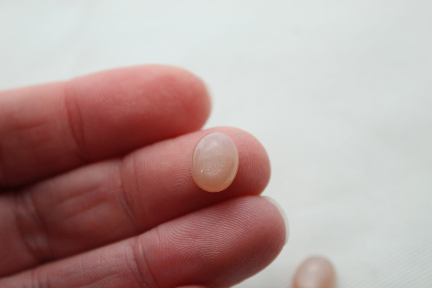 TWO peach Moonstone cabochons 8X10 MM Gemstones oval