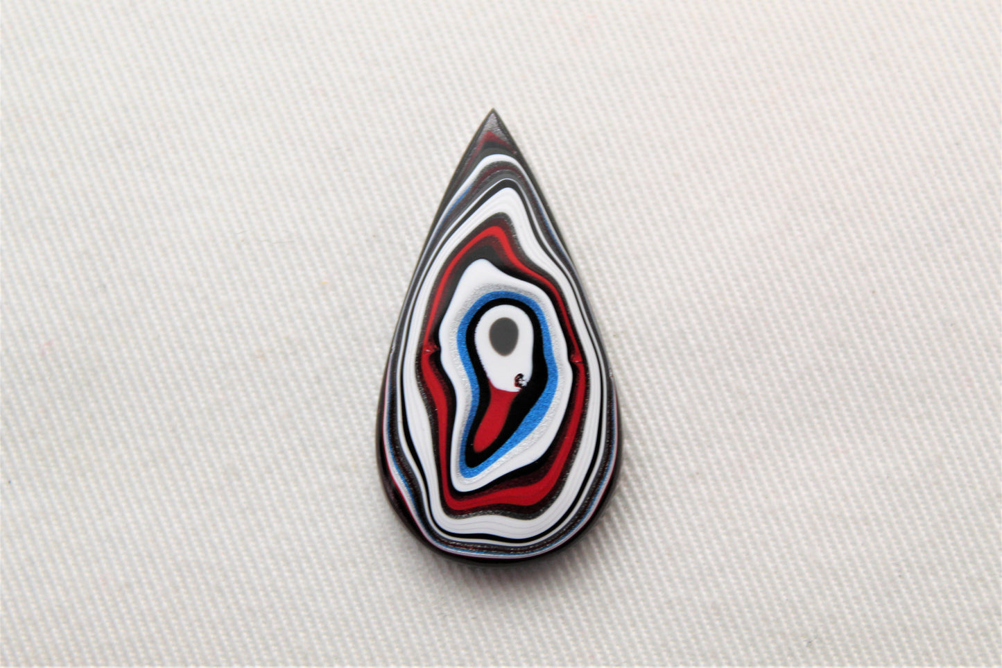 Fordite Cabochon teardrop white red