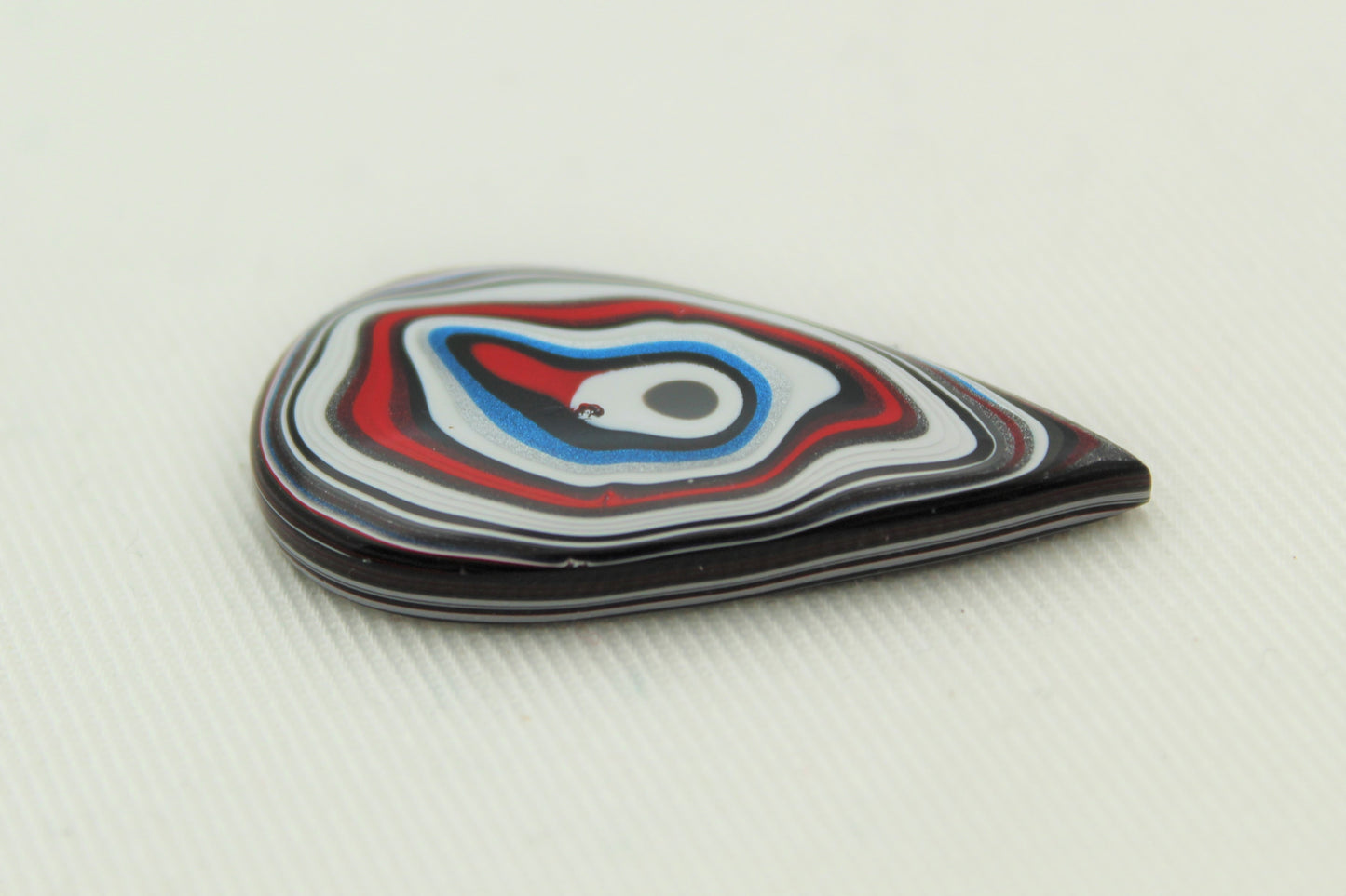 Fordite Cabochon teardrop white red