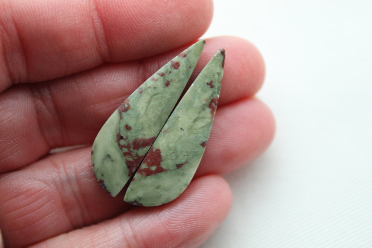 Pair of Red Fiber Jasper Cabochons