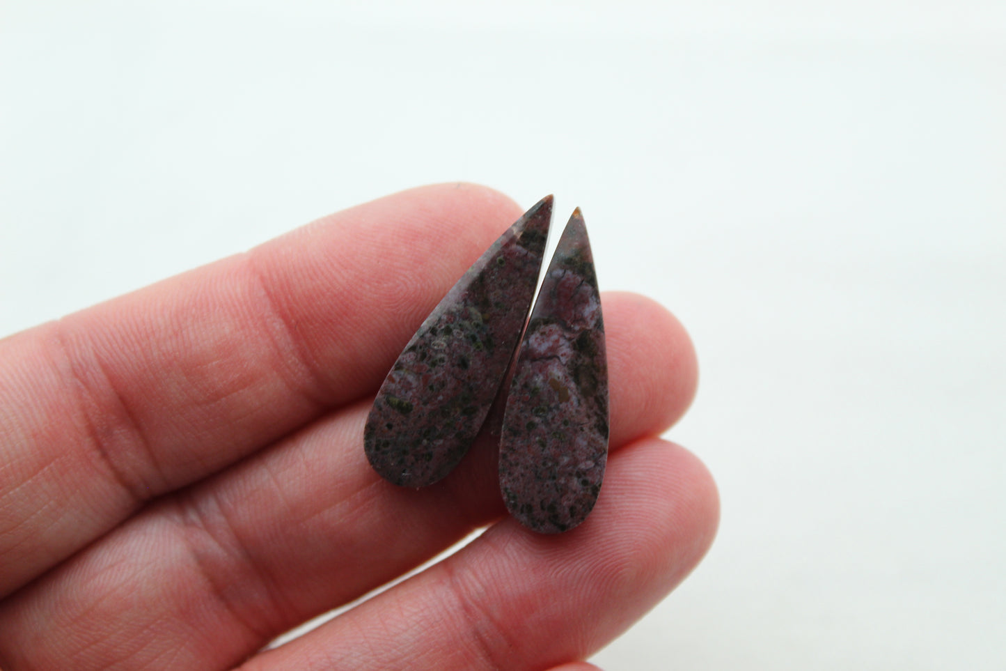 Small pair of Petrified Wood Cisero Cabochons dark purple