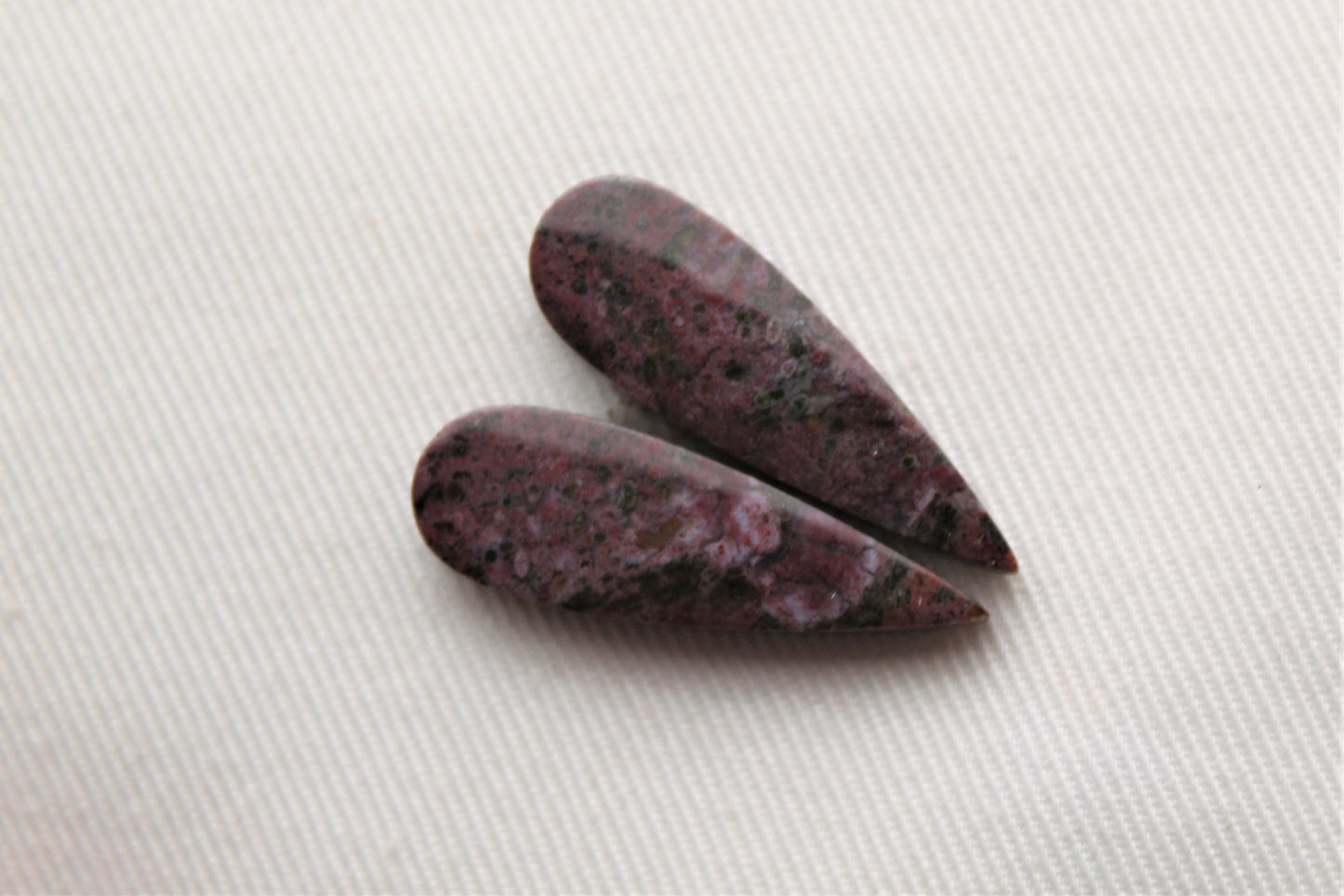 Small pair of Petrified Wood Cisero Cabochons dark purple