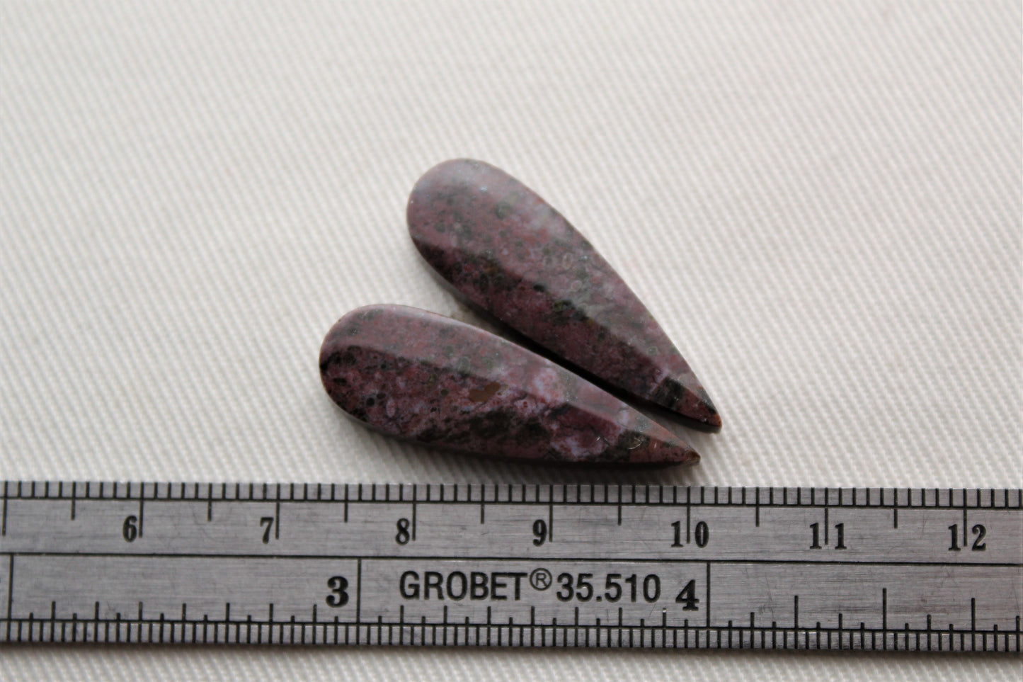 Small pair of Petrified Wood Cisero Cabochons dark purple