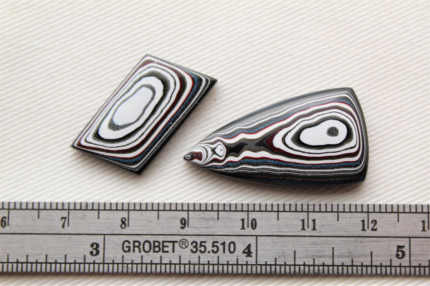 TWO Fordite Cabochon white red black mismatched